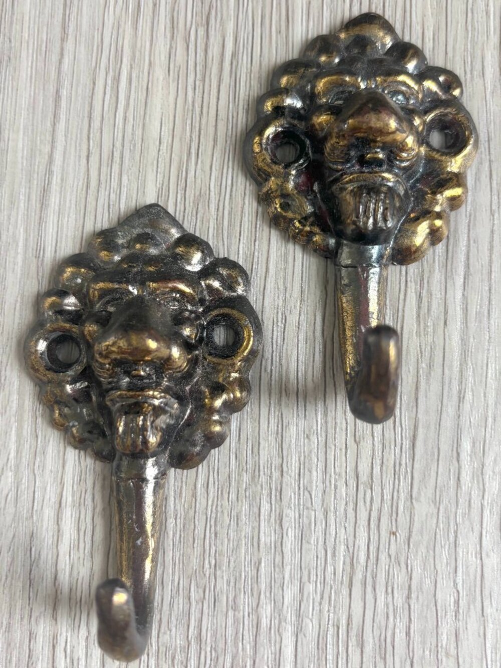 Pair of Vintage Brass Lion Hooks